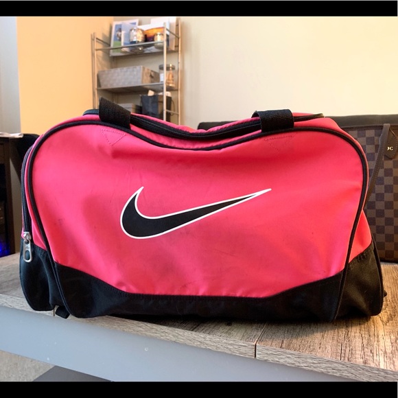 Nike Handbags - Hot Pink Nike Gym Duffle Weekender Shoulder Bag